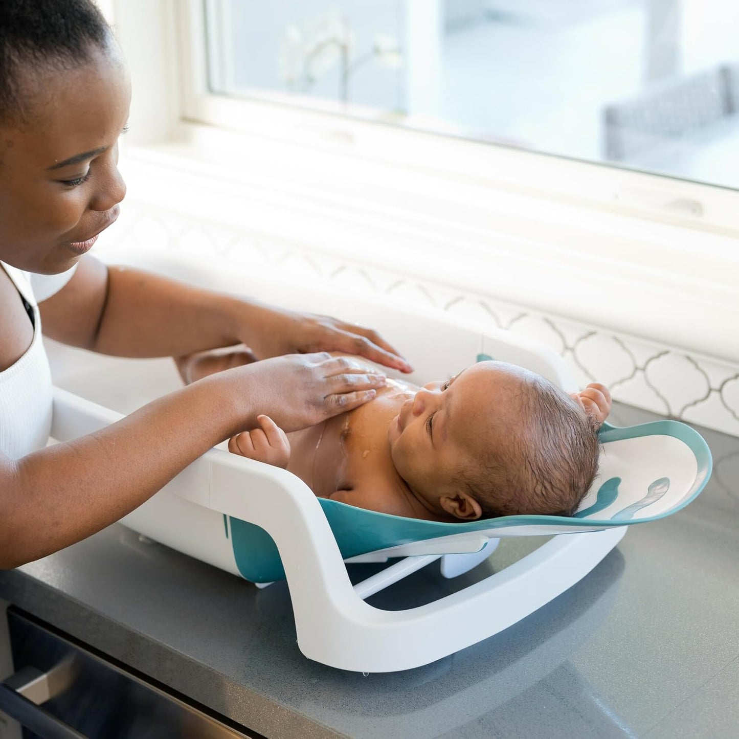 The First Years Sure Comfort 4-in-1 Reclining Baby Bathtub